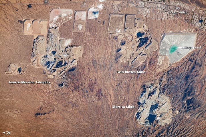   Photo: Open pit mines outside of Green Valley, Arizona (occupied territory of Hohokam people) as seen from satellite  